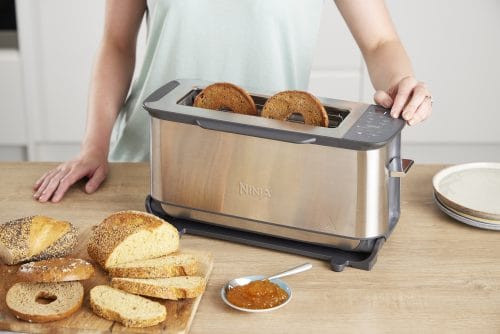 Ninja-ST202UK-InUse-ArtisanalBread-Woman-CloseUp Ninja-ST202UK-InUse-ArtisanalBread-Woman-CloseUp